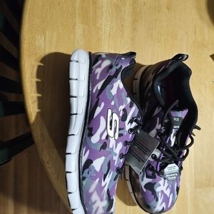 Sketchers, steel toe tennis shoes.